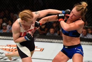 CHICAGO, IL - JULY 23: (L-R) Valentina Shevchenko of Kyrgyzstan punches Holly Holm in their women's bantamweight bout during the UFC Fight Night event at the United Center on July 23, 2016 in Chicago, Illinois. (Photo by Josh Hedges/Zuffa LLC/Zuffa LLC via Getty Images)