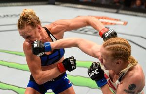 CHICAGO, IL - JULY 23: (R-L) Valentina Shevchenko of Kyrgyzstan punches Holly Holm in their women's bantamweight bout during the UFC Fight Night event at the United Center on July 23, 2016 in Chicago, Illinois. (Photo by Josh Hedges/Zuffa LLC/Zuffa LLC via Getty Images)