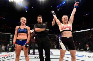 CHICAGO, IL - JULY 23: (R-L) Valentina Shevchenko of Kyrgyzstan celebrates after defeating Holly Holm by unanimous decision in their women's bantamweight bout during the UFC Fight Night event at the United Center on July 23, 2016 in Chicago, Illinois. (Photo by Josh Hedges/Zuffa LLC/Zuffa LLC via Getty Images)