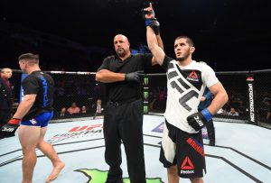 HIDALGO, TX - SEPTEMBER 17: (R-L) Islam Makhachev of Russia celebrates his victory over Chris Wade in their lightweight bout during the UFC Fight Night event at State Farm Arena on September 17, 2016 in Hidalgo, Texas. (Photo by Josh Hedges/Zuffa LLC/Zuffa LLC via Getty Images)